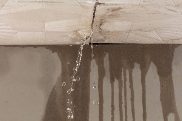 Professional Commercial Water Damage Restoration technician working in Leverett, MA